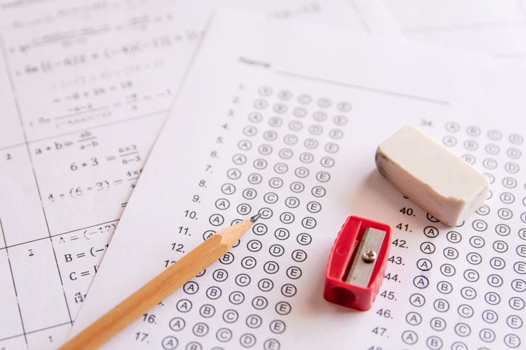 A state mandated math final about to be taken to prepare students for the next year of life. Unfortunately, those grades never helped the students as they went on to dropout of school and pick up jobs at the local McDonald’s. Image from iStock.