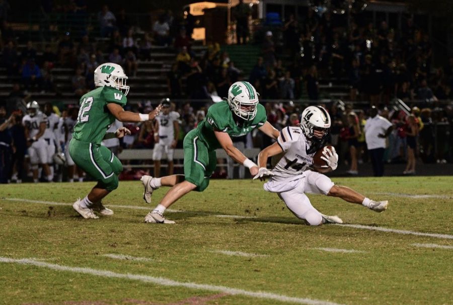 Senior Conner OKeefe (#51) and Sophomore Michael Luisa (#42) on Fridays game against Cuthbertson.