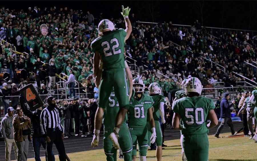 Kyle Parsons (#22) celebrating the scoreboard with Conner OKeefe (#51).