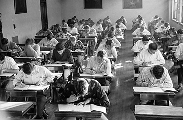Photo by Francis Miller/ High school students taking first-ever National Merit Scholarship Program exams in 1955. 
