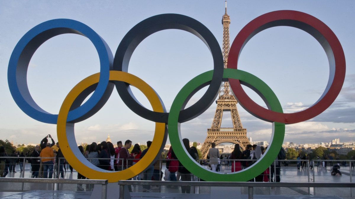 FILE - The Olympic rings are set up at Trocadero plaza that overlooks the Eiffel Tower in Paris, Sept. 14, 2017. Russia says that 10 of its wrestlers who were offered spots at the Paris Olympics as neutrals will refuse to compete. The Russian wrestling federation says that its officials, coaches and athletes held a meeting and “came to an unanimous decision — to refuse to participate in the Olympic Games.” (AP Photo/Michel Euler, File)